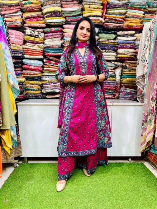 Elegant Premium Pure Cotton Anarkali featuring embroidered neckline, complemented by a flared plazzo and a pure cotton dupatta.