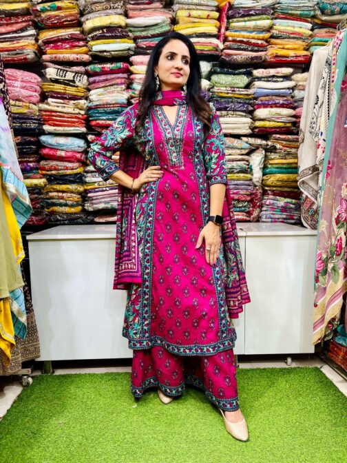 Elegant Premium Pure Cotton Anarkali featuring embroidered neckline, complemented by a flared plazzo and a pure cotton dupatta.
