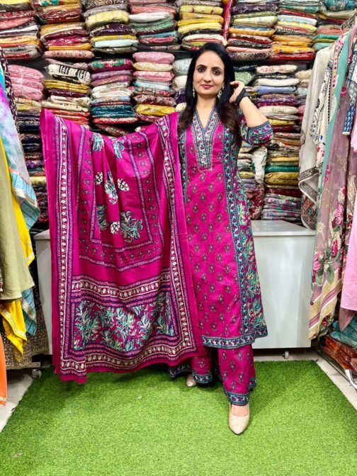 Elegant Premium Pure Cotton Anarkali featuring embroidered neckline, complemented by a flared plazzo and a pure cotton dupatta.