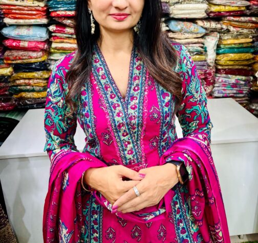 Elegant Premium Pure Cotton Anarkali featuring embroidered neckline, complemented by a flared plazzo and a pure cotton dupatta.