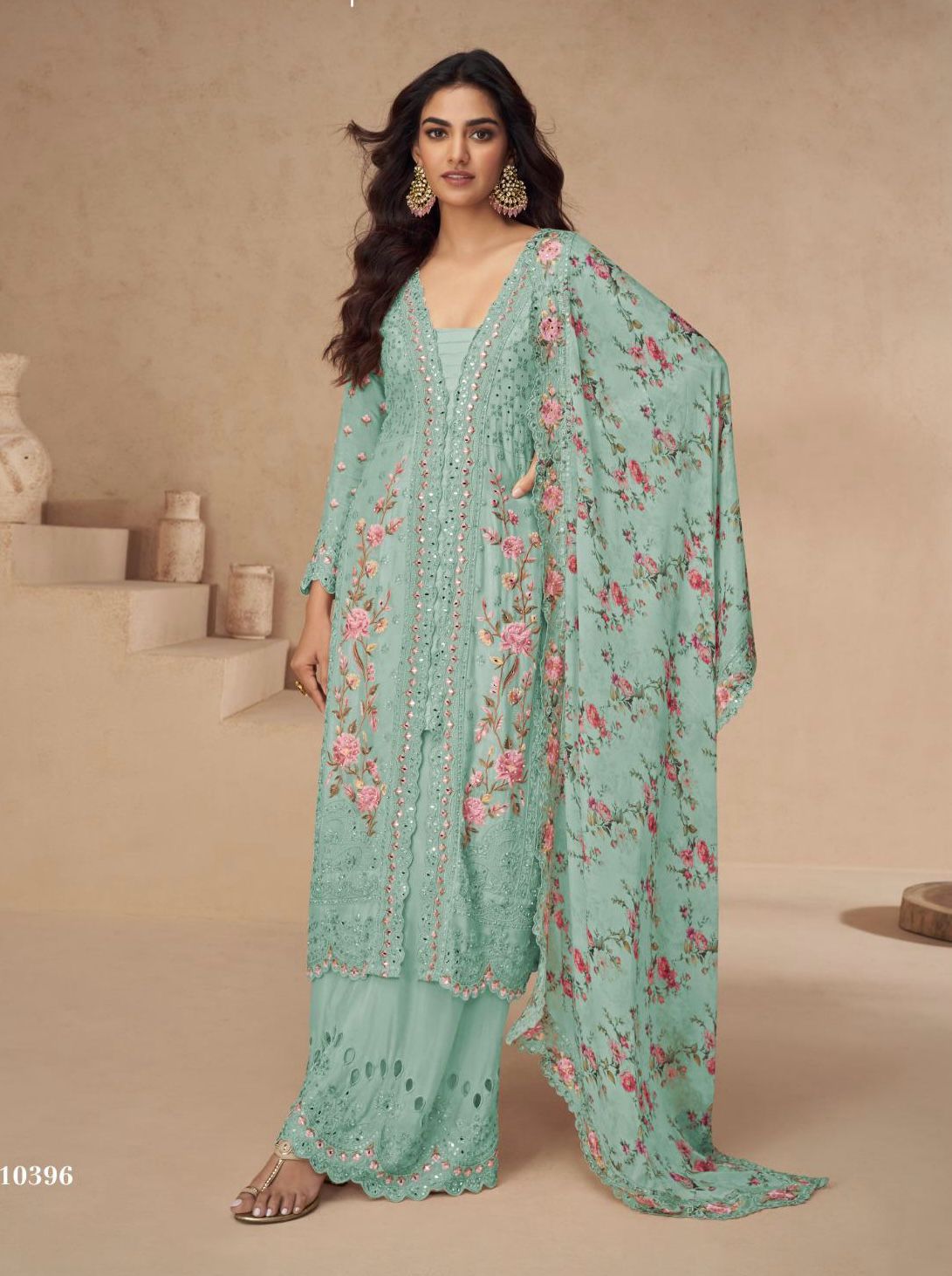 Exclusive Pakistani suit crafted in pure chinon fabric with embroidery, paired with designer palazzo and matching dupatta.