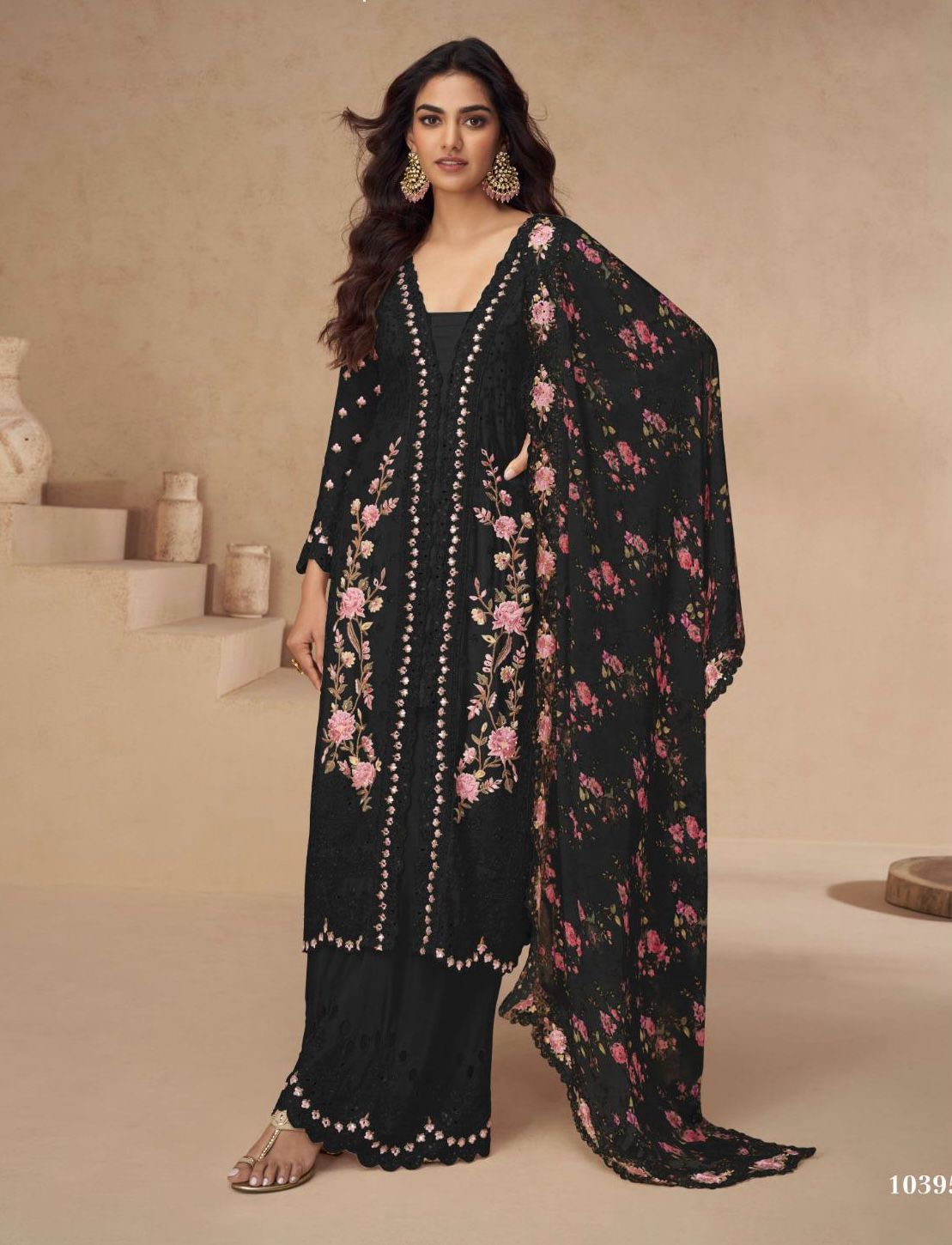 Premium Pakistani suit made of pure chinon fabric with embroidery, complemented by a designer palazzo and matching dupatta.