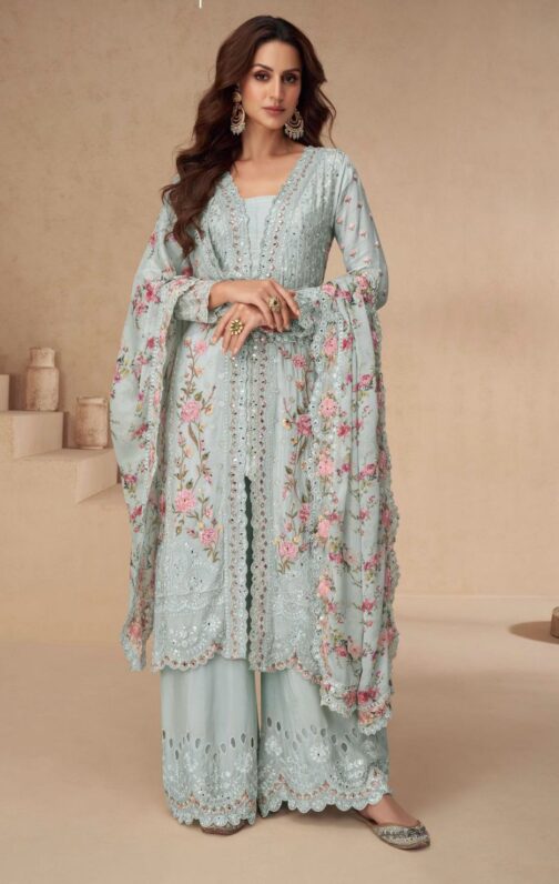Luxury Pakistani suit crafted in pure chinon with intricate embroidery, complemented by a designer palazzo and matching dupatta.