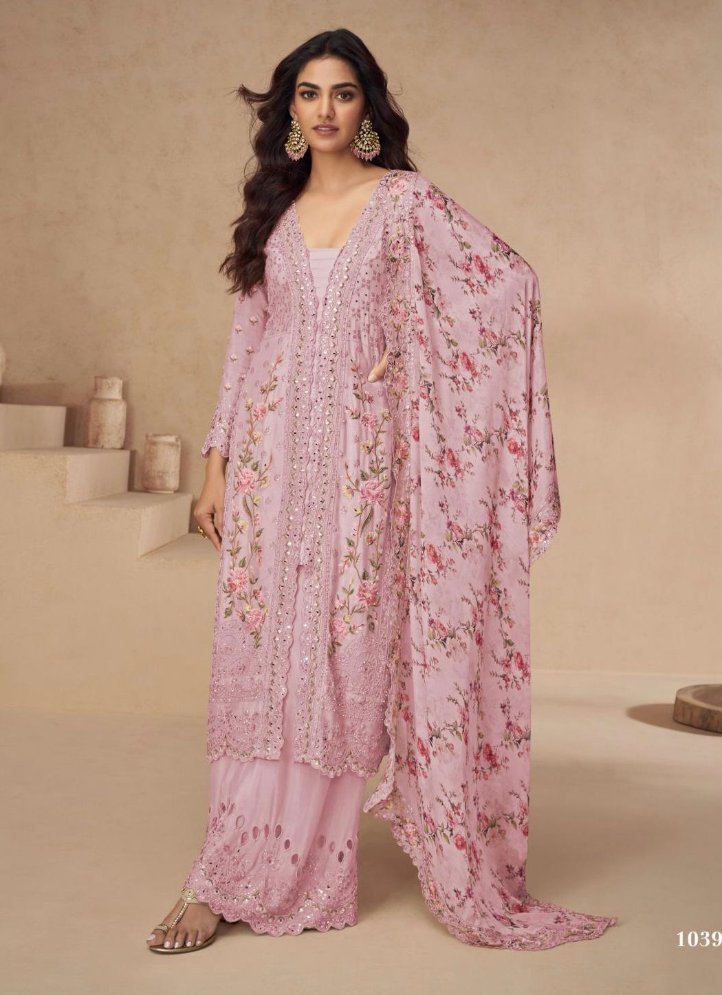 Exclusive Pakistani suit made of pure chinon fabric with embroidery, paired with a designer palazzo and matching dupatta.