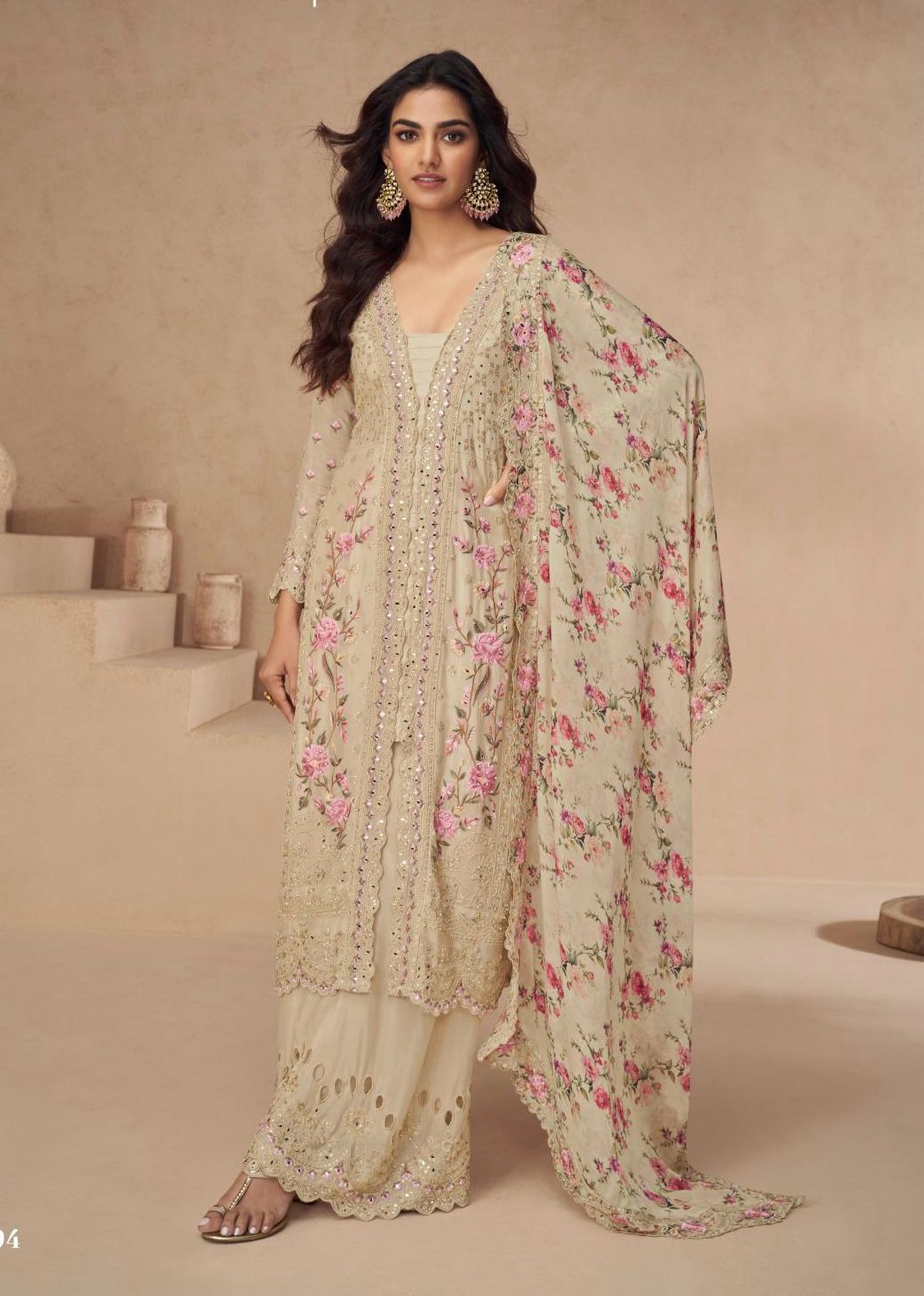 Premium Pakistani suit crafted in pure chinon with intricate embroidery, complemented by a designer palazzo and matching dupatta
