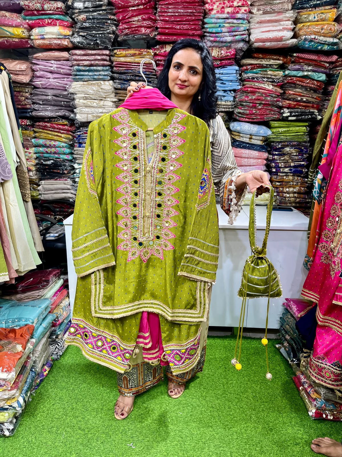 Designer Four Peice Set with Potli